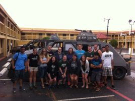 Students in front of van